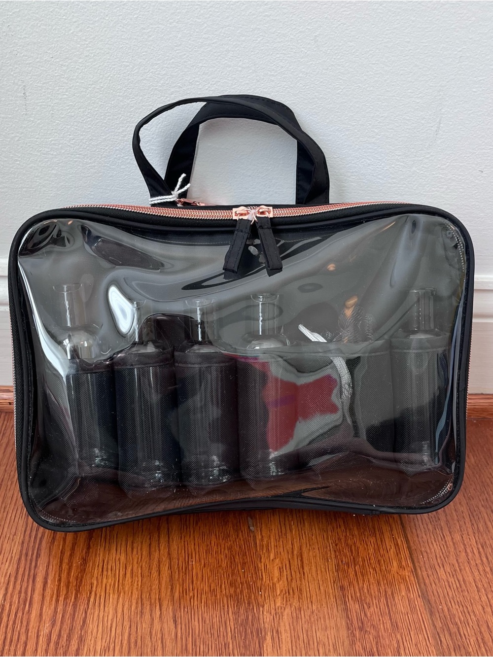 Tartan + Twine Clear Travel Toiletry Bag with Black Organizer Pouches.